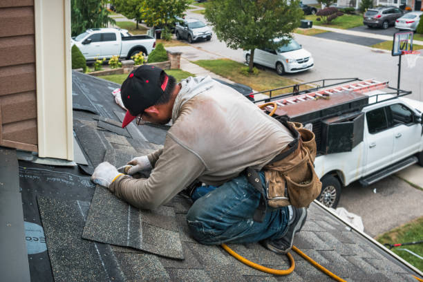 Professional Roofing technician working in Johnson City, KS